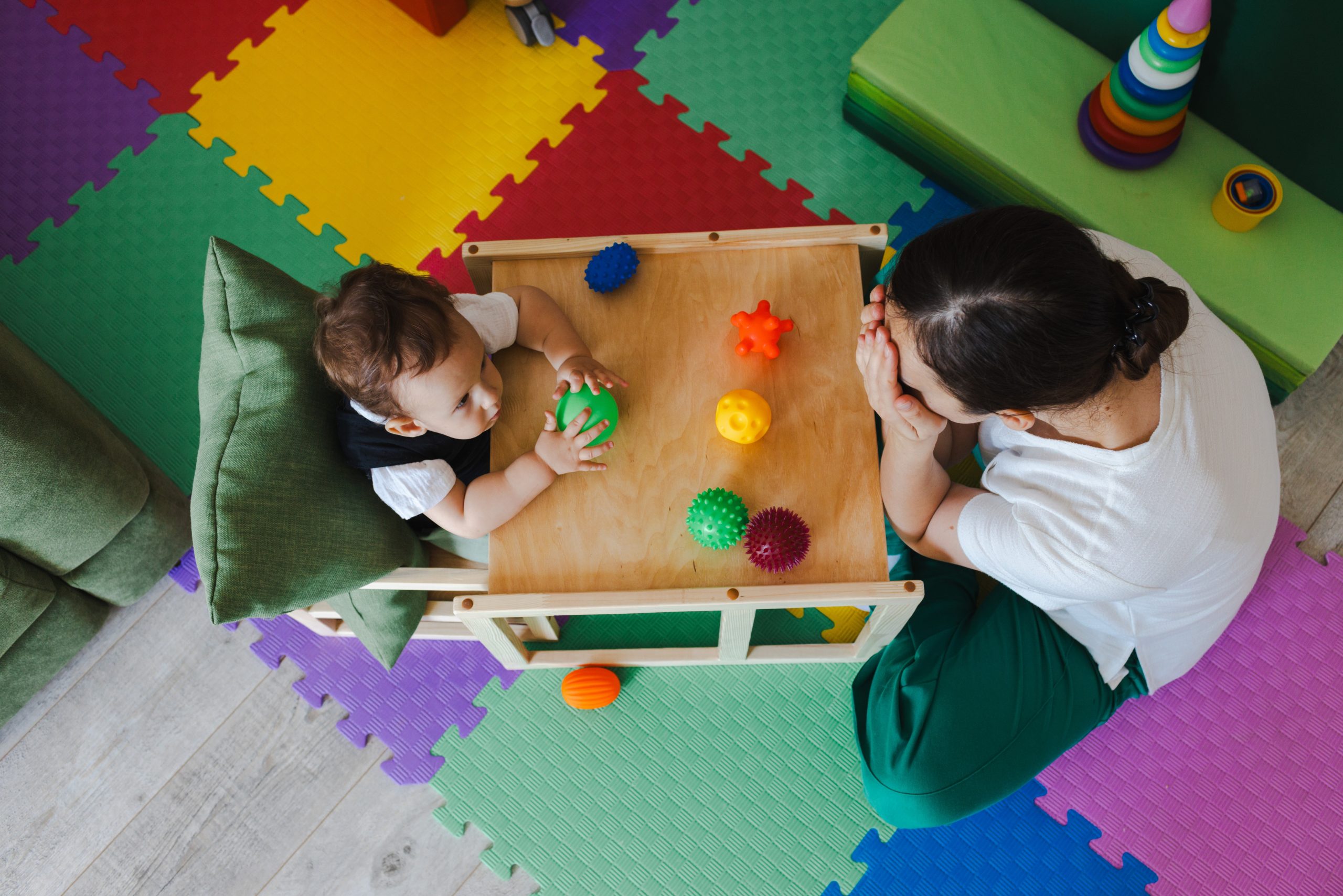 woman-playing-educational-games-with-toddler